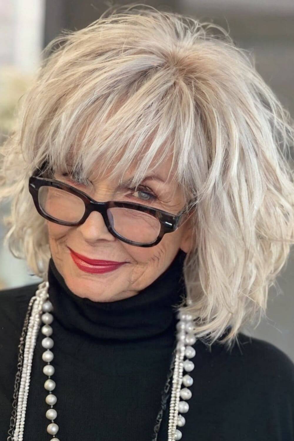 Icy Messy Bob Cut with Layer Hairstyle for Women Over 60 with Glasses