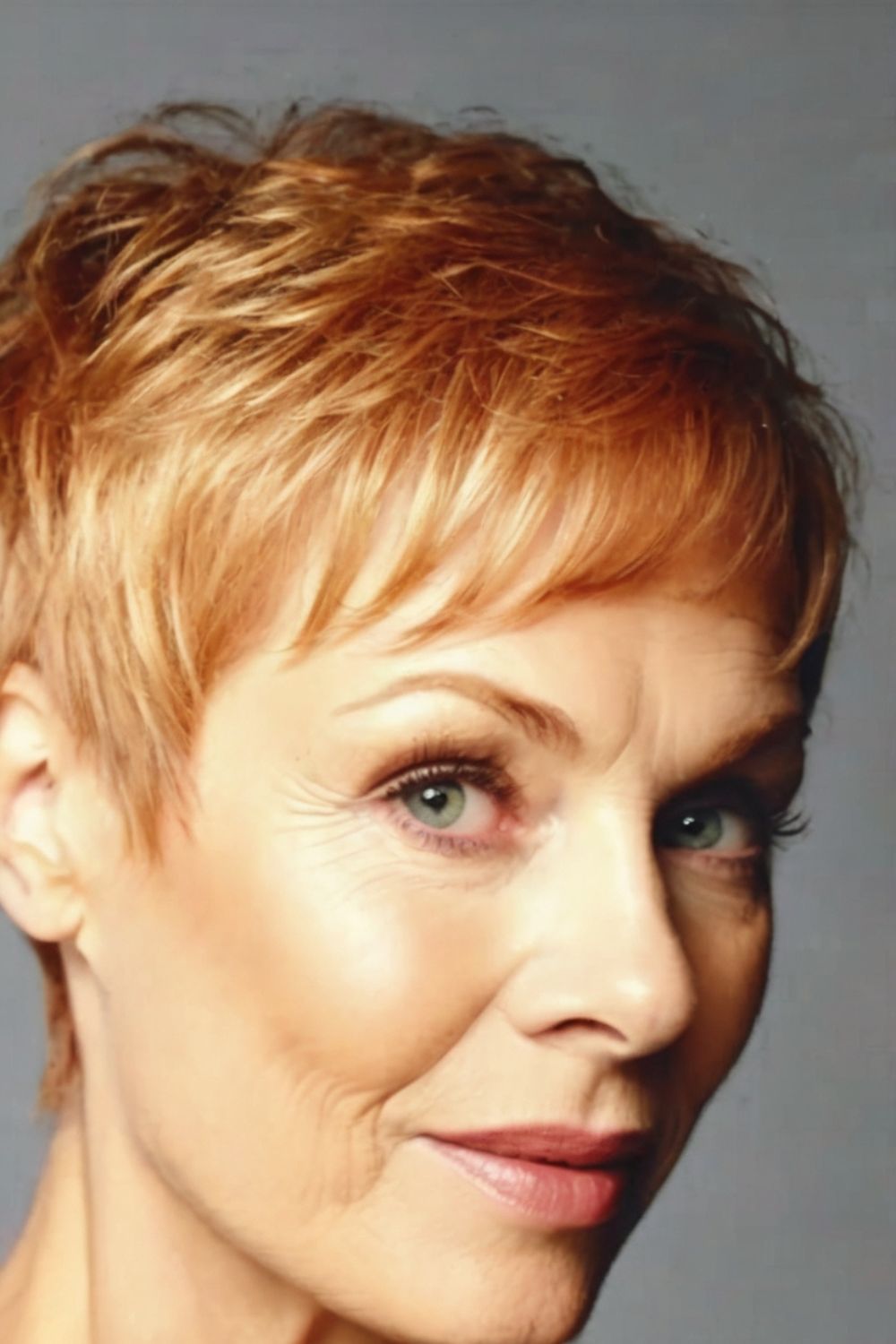 Strawberry Blonde Pixie with Face Framing